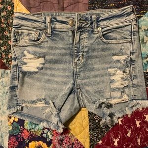 EUC AE stretchy distressed acid wash cut off midi shorts